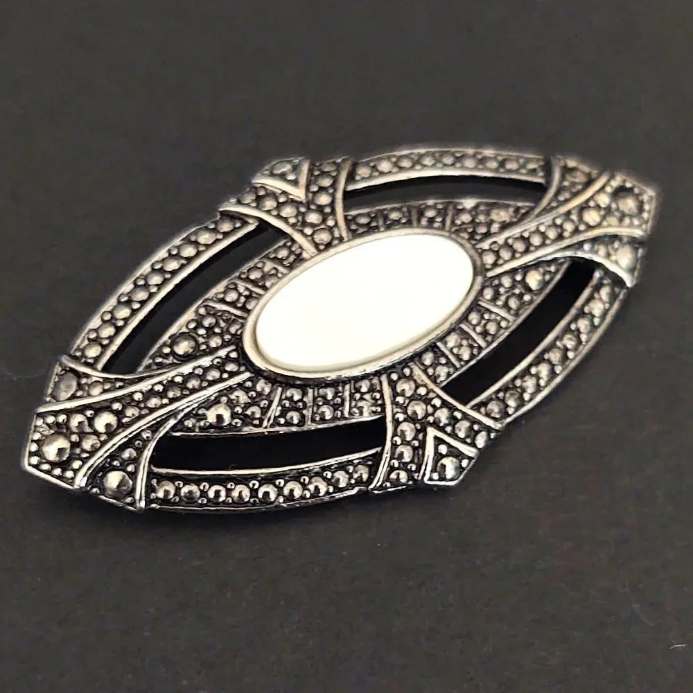 Textured silver and MOP brooch